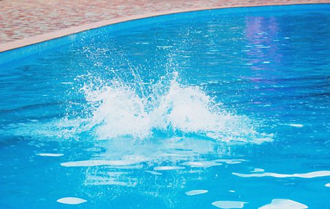 A photograph of a splash in a swimming pool just like the splash from A Bigger Splash