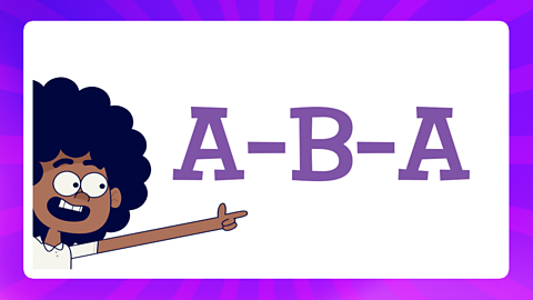 Asha pointing at the letters a-b-a representing ternary form.