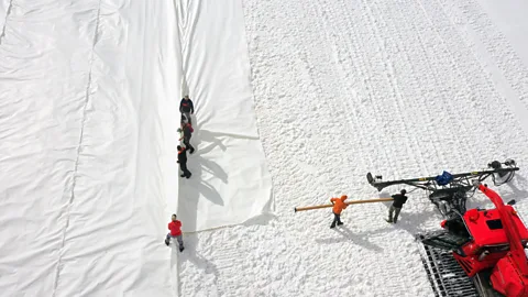 Miguel Medina / Getty Images Some ski resorts are covering glaciers in protective blankets to stop them from melting in the summer (Credit: Miguel Medina / Getty Images)