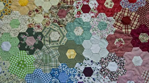 Patchwork quilt made of patterned hexagons