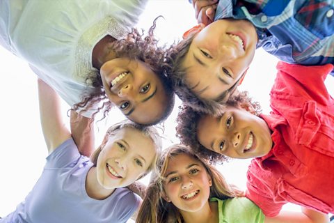 A group of smiling children.