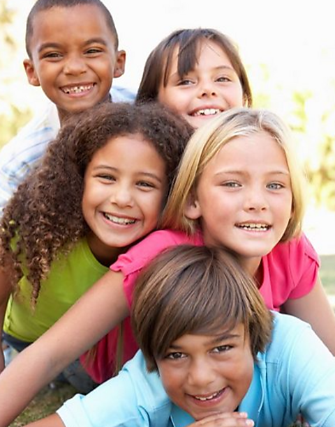 A group of smiling young people.
