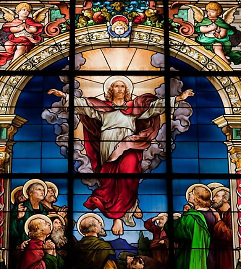 The Ascension of Jesus depicted in stained glass.