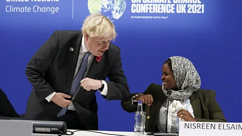 Kevin Lamarque/Getty Images Nisreen Elsaim, pictured here with Boris Johnson at Cop26, says young people are often given less floor time than other speakers at events (Credit: Kevin Lamarque/Getty Images)