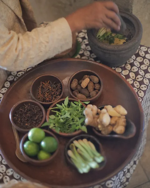 Amanjiwo The herbal drink is made of natural ingredients such as ginger, turmeric, cloves, fennel, lime and tamarind (Credit: Amanjiwo)