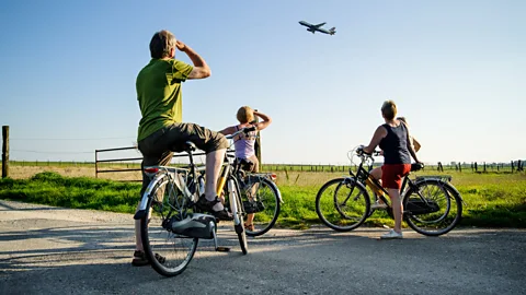 Lander Loeckx/Alamy Three-day weekends could lead to more carbon-intensive leisure plans – like taking flights. But it could also be spent on lower carbon activities (Credit: Lander Loeckx/Alamy)