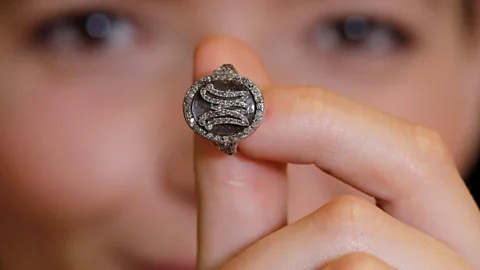 Alamy A tiny pinky ring, monogrammed in diamonds, that was owned by Marie Antoinette was auctioned in 2018 (Credit: Alamy)