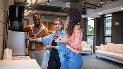 Getty Images Casual conversation among colleagues can often be alienating to LGBTQ+ workers (Credit: Getty Images)