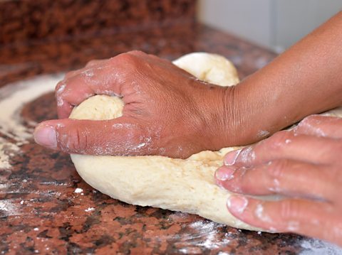 Kneading dough.