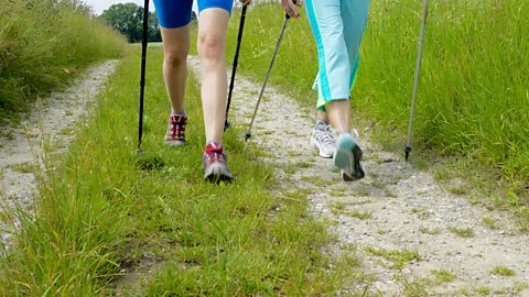 Getty Images Exercise, such as Nordic walking, plays an important part in a typical parent-child health retreat (Credit: Getty Images)