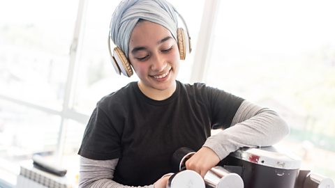 A person holds weights