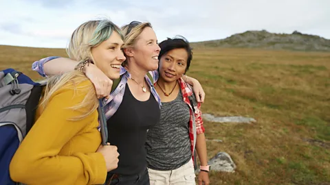 Getty Images A group of friends hiking together in the countryside (Credit: Getty Images)