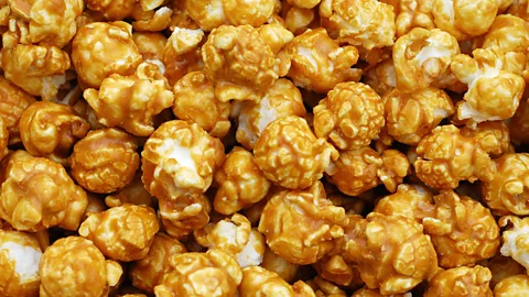 Getty Images The writer's lasting memory of the meal is the final mouthful - a piece of caramel-coated popcorn (Credit: Getty Images)