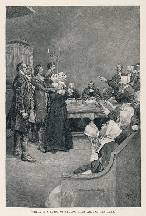 An engraving showing a witch being accused at the Salem Witch Trials, 1692.