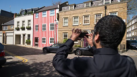 Getty Images A homeowner in Kensington, London, chose candy stripes for her house front – it proved to be a divisive look (Credit: Getty Images)