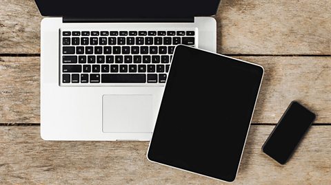 laptop, tablet and iphone together on a table