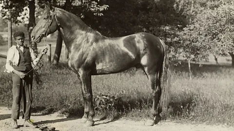 Vintage Images/Alamy The rise of Jim Crow laws forced Black jockeys to become trainers and caretakers (Credit: Vintage Images/Alamy)
