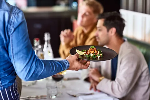 Getty Images While these high earners take trips with friends several times a year, frequently eat at restaurants, and put money into savings, it never feels like enough (Credit: Getty Images)