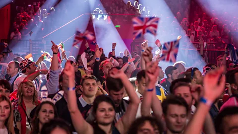 Getty Images Crowd waving UK flags at Eurovision in Kyiv, Ukraine, 2017 (Credit: Getty Images)