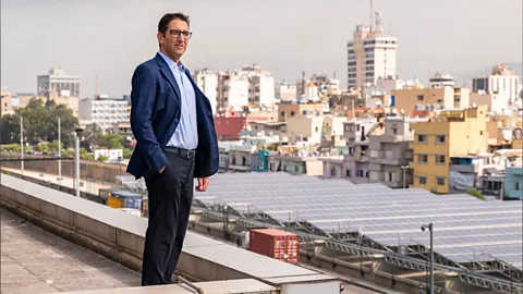 Patrick Gaillardin Pierre El-Khoury stands on the roof of the Ministry of Energy and Water overlooking his Beirut river solar snake project (Credit: Patrick Gaillardin)