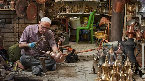 Simon Urwin Al-Saffar is a fifth-generation coppersmith who works in a millennium-old souq (Credit: Simon Urwin)