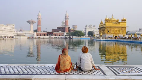 Alison Wright/Getty Images The Sikh religion places a strong emphasis on doing good deeds and helping others (Credit: Alison Wright/Getty Images)
