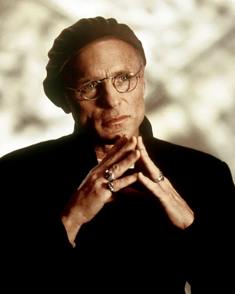 Alamy The man pulling the strings in the film is manipulative show creator and producer Christof (played by Ed Harris) (Credit: Alamy)