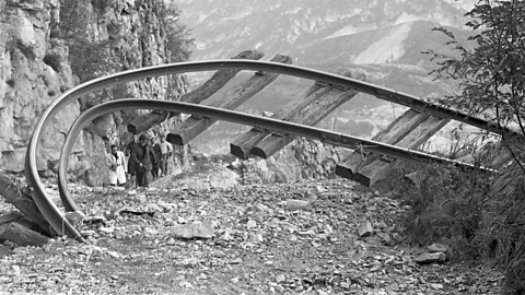 Getty Images A warped railtrack damaged following the failure of the Vajont dam in Italy in 1963 (Credit: Getty Images)
