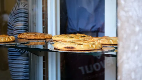 Matteo Vieille Romans and tourists alike love the Crostata di ricotta e visciole at Pasticceria Boccione (Credit: Matteo Vieille)