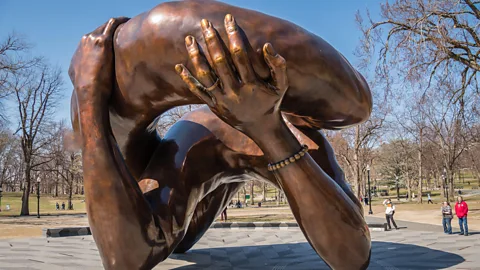 Heidi Besen/Alamy The newly unveiled statue, The Embrace, pays tribute to Dr Martin Luther King Jr, who considered Boston his "second home" (Credit: Heidi Besen/Alamy)