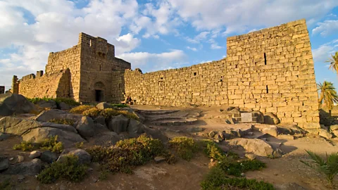 Robert Harding/Alamy Qasr al-Azraq is one of many desert castles dotted across the region (Credit: Robert Harding/Alamy)