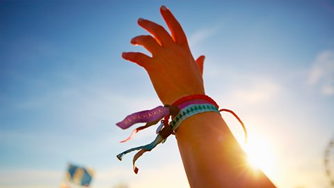 Hand waving in the air at festival 