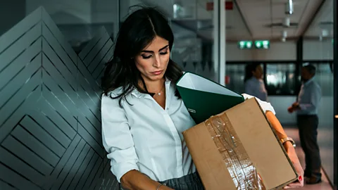 Professional woman quitting office job