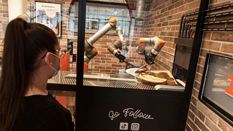 Getty Images Experts say it's possible companies will accept automation that may not be quite as good as human labour, so they don't have to spend money on labourers (Credit: Getty Images)