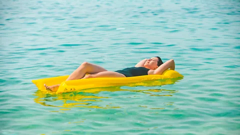 Getty Images There is no current guidance for swimmers to turn their bvacks on brightly coloured swimsuits and accessories (Credit: Getty Images)