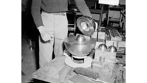 Alamy The goal was a scientific examination of the accident. Physicist Chris Wright posed with the reconstructed "critical assembly" (Credit: Alamy)