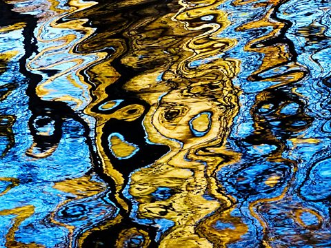Reflections in rippling water.