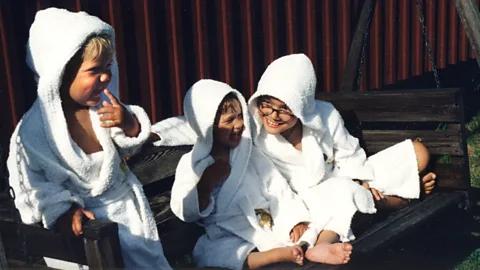 Helene Cederroth Emma, Hugo and Wilhelm Cederroth in bath robes (Credit: Helene Cederroth)