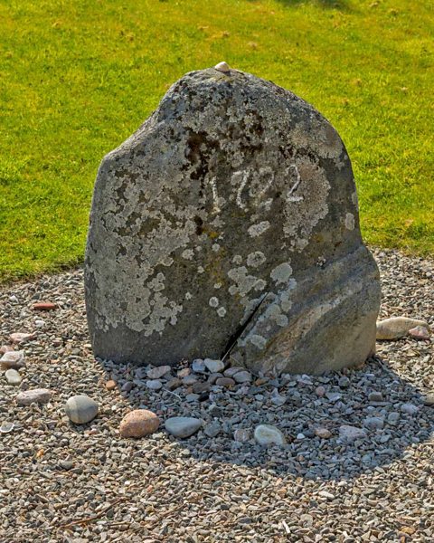 Memorial stone inscribed with the date 1722, marking the execution site of Janet Horne