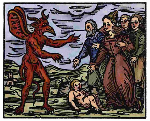 Coloured woodcut print showing witches offering a child as sacrifice to a devil or demon.