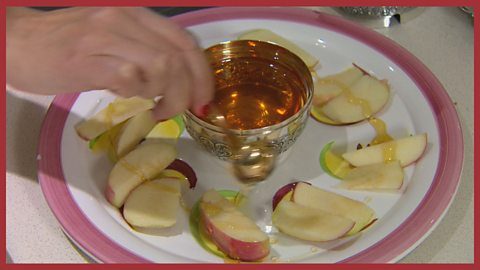 Image: a plate of apples and honey