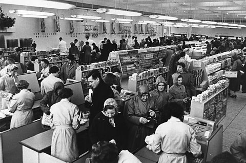 A photograph showing a newly opened supermarket in Maidenhead where people are helping themselves to items.