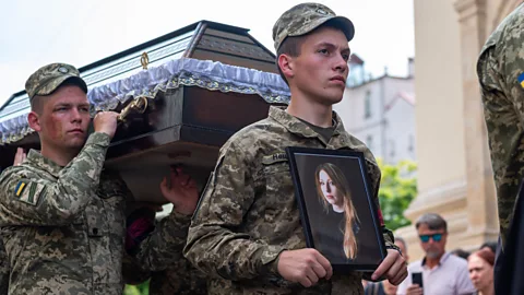 Getty Images The funeral of award-winning novelist, poet and essayist Victoria Amelina in Lviv in July 2023 (Credit: Getty Images)