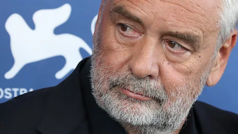 Getty Images Luc Besson attends a photocall at the Venice Film Festival, where his film Dogman was shown (Credit: Getty Images)
