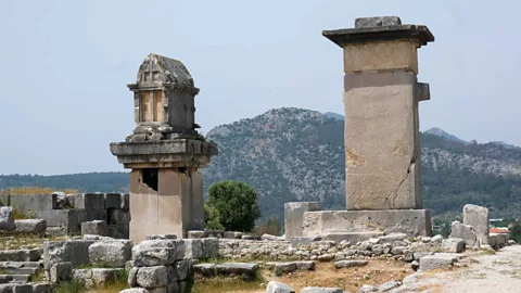 Alastair Gill Tower-like pillar tombs can be seen in the ruins of Xanthos, capital of Lycia under the Persians (Credit: Alastair Gill)