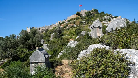 Alastair Gill Lycian sarcophagi are scattered along the Lycian Way, including around Simena Castle (Credit: Alastair Gill)