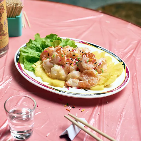 Yen Wei and Ryan Chen The prawns are fried, coated with Japanese mayonnaise and served with pineapple (Credit: Yen Wei and Ryan Chen)