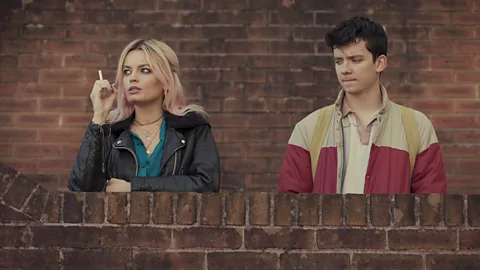 Netflix Sex Education, starring Emma Mackey as Maeve and Asa Butterfield as Otis, premiered in January 2019 (Credit: Netflix)