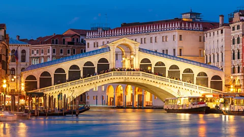 Eye35/Alamy Day trippers usually head straight for landmarks such as the Rialto Bridge (Credit: Eye35/Alamy)