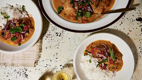 Louise Hagger Three plates of Sarawak white chicken served with white rice